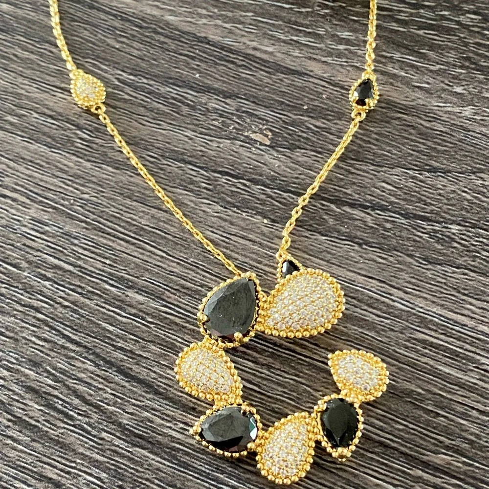 Gold and black tone‎ necklace and earring set